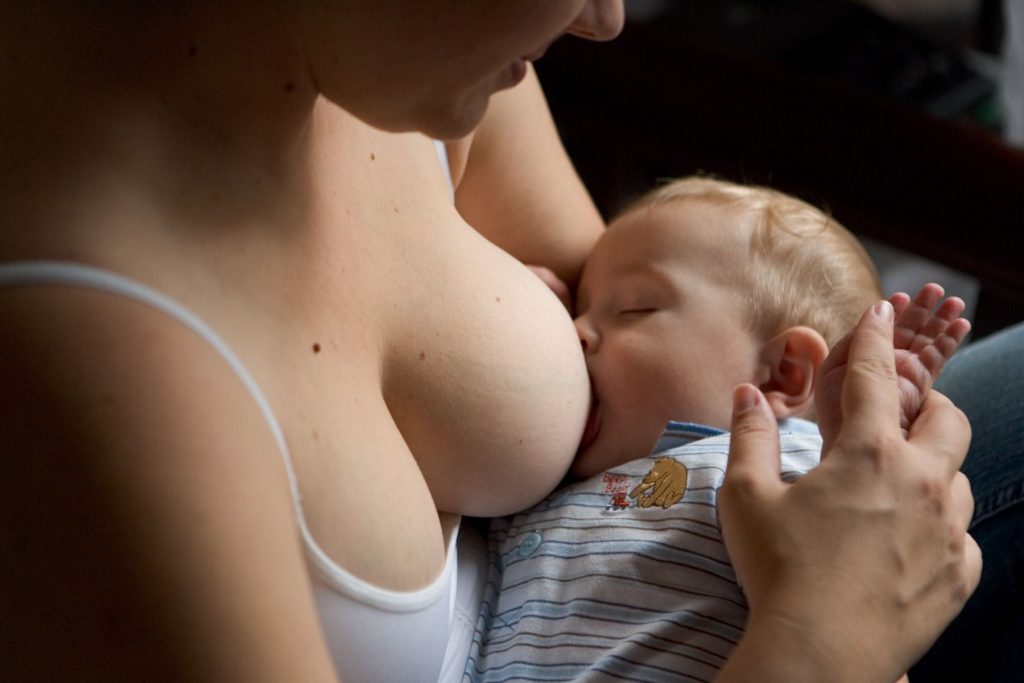 Sucking own breast milk
