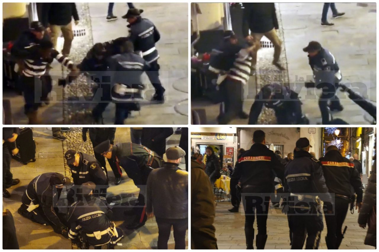 Reagisce come una furia al controllo: 4 vigili per fermarlo, gente lo difende. Video
