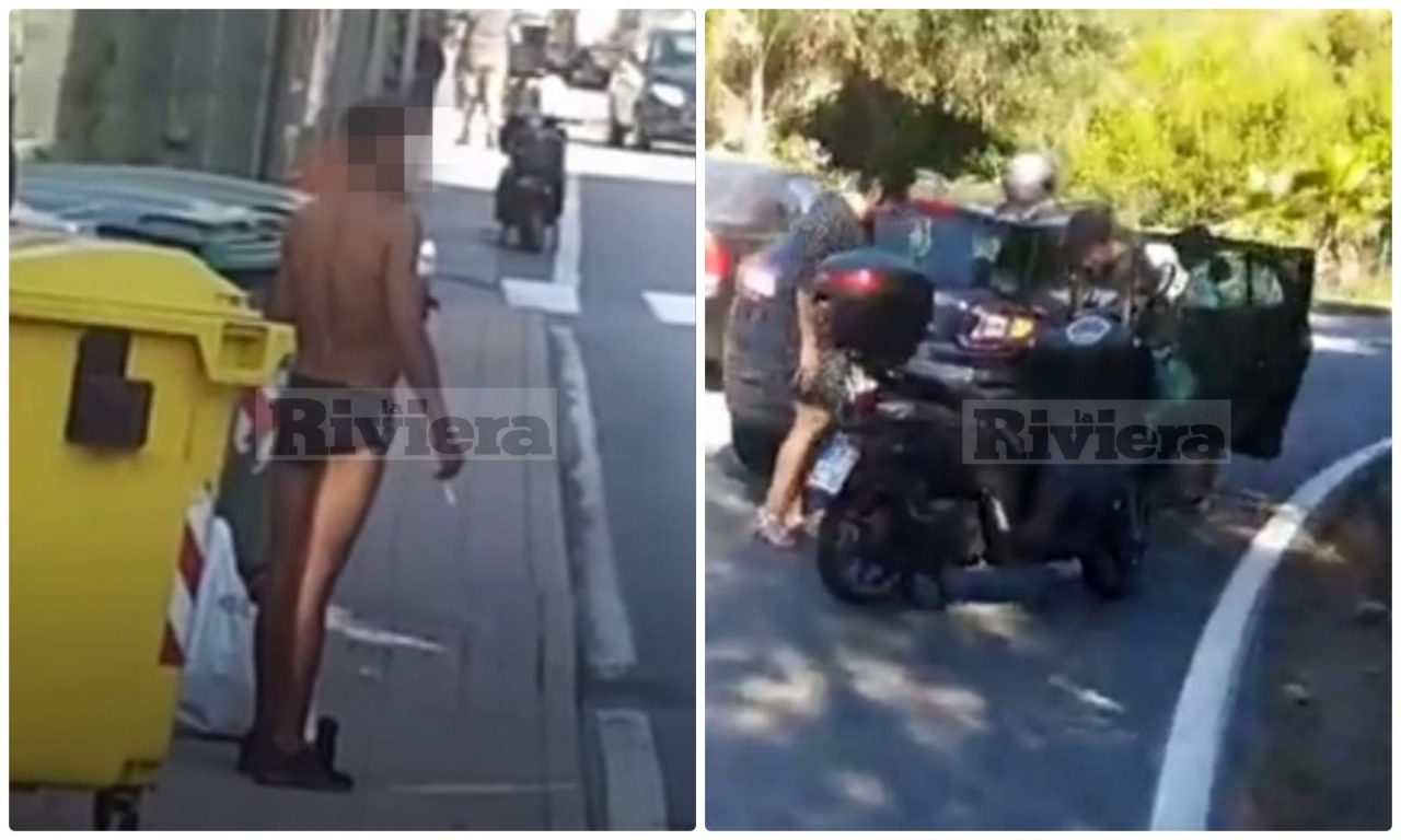 Si spoglia per strada e gira in mutande fumando una sigaretta. Video