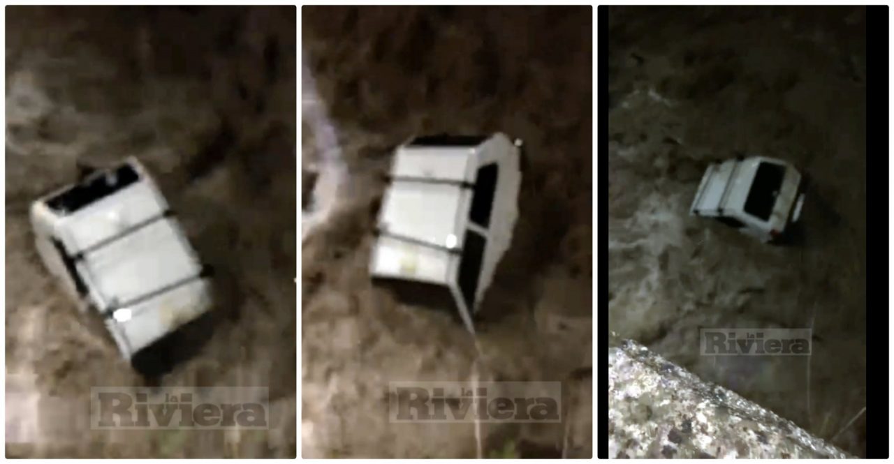 Auto trascinata via dalla forza del torrente Bevera in piena